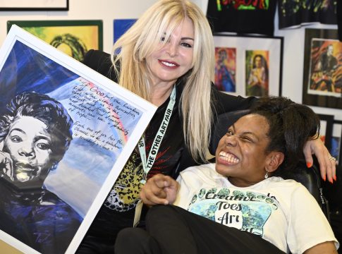 Photo: Taty Tatyana Horoshko gifted this painting of Maya Angelou to the daughter of a single working mom who was a fan of her art at the Dallas The Other Art Fair. The daughter paints with her toes holding the brush. Credit: xxx.