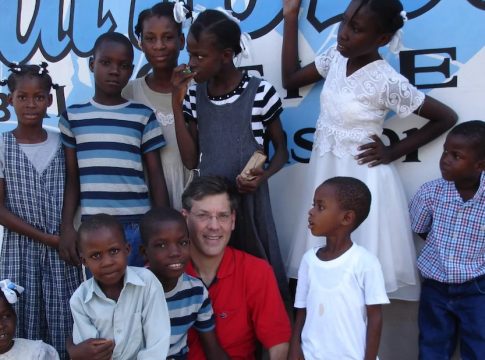Author with the children of Orphans International Haiti in Léogâne after Hurricane Jeanne (2005). Photo credit: Orphans International Worldwide.