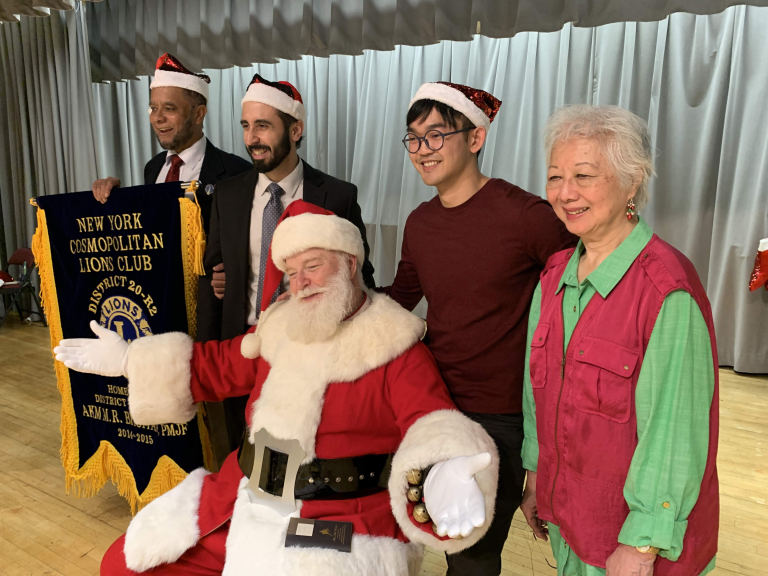 With Santa Claus, Children Every Year on New York’s Lower East Side