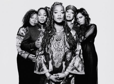 Photo: Black-and-white photograph of Malcolm X’s Daughters, by Platon. Shown from left to right are five of Malcolm X’s six daughters including: Qubilah Shabazz, Gamilah Lumumba Shabazz, Malaak Shabazz, Attallah Shabazz, and Ilyasah Shabazz. Credit: Line Collection of the Smithsonian National Museum of African American History and Culture, Gift of Platon, 2009 (British photographer, born 1968).