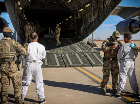 The Department of Homeland Security released images of the first flight of undocumented migrants preparing to take off for Guantanamo Bay from Fort Bliss, Texas, Feb. 4, 2025.