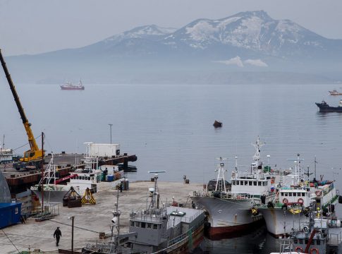 Boats in the port of Yuzhno-Kurilsk on Kunashir Island. Photo credit: Sergei Krasnoukhov / TASS.