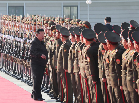 Kim Jong Un reviews North Korean troops.