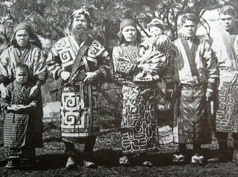 Righting historical wrongs: A group of Ainu are captured on film in 1904, during a period when large numbers of sets of Ainu remains were unearthed by Japanese archaeologists for research and display at universities across the country. Photo credit: Wikipedia Commons.