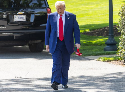 U.S. President Donald Trump walks toward the press before boarding Marine One on the South Lawn of the White House in Washington, D.C., the United States, on April 29, 2025. Photo credit: Xinhua/Hu Yousong.