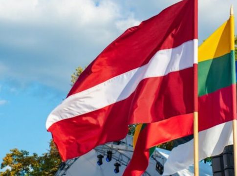 Flags of Estonia, Latvia, Lithuania wave proudly in the Baltic breeze.