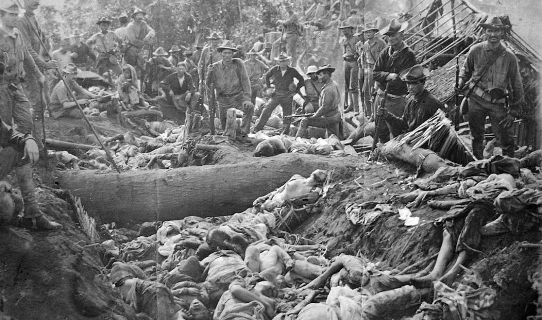 US-soldiers-pose-with-the-bodies-of-Moro-insurgents-Philippines-1906
