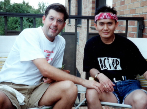 During the AIDS Epidemic, the author with a "Red Ribbons Are Not Enough" shirt with his partner wearing an ACT-UP t-shirt, 1993. Photo: Jim Luce.