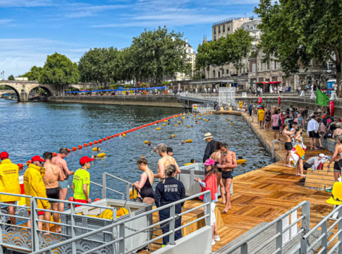 Historic Plunge: Parisians Return To Swim in Seine After Century