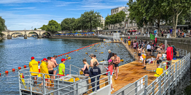 Historic Plunge: Parisians Return To Swim in Seine After Century