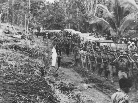 Saluting Permesta troops in North Sulawesi, Indonesia, 1959