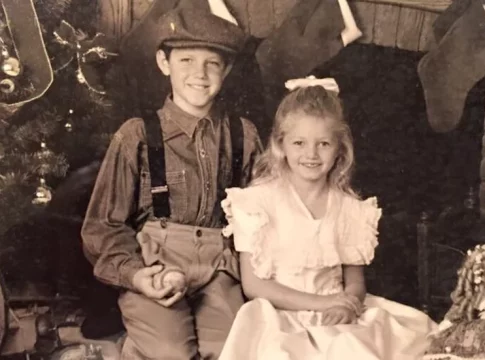 Siblings Maddie and Grant Bauer growing up at Christmas in Ohio. Photo: The Stewardship Report.