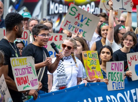 Activists outside the International Court of Justice (ICJ) in The Hague as the Court delivers its advisory opinion on the obligations of States in respect of climate change. Photo credit: © ICJ-CIJ / Frank van Beek.