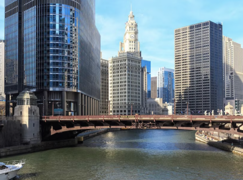 Chicago’s iconic loop: the Chicago River and Michigan Avenue Bridge stand as symbols of urban resilience amid federal funding freeze.