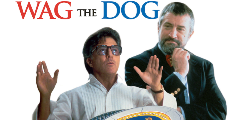 In the political satire Wag the Dog (1997), a Hollywood producer and a presidential spin doctor manufacture a fictional war to distract the public from a White House scandal—an enduring cultural metaphor for the use of foreign crises to deflect attention from domestic political troubles. Photo credit:Studio publicity still, Wag the Dog  (1997).